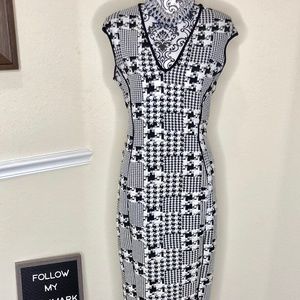 SLEEVELESS MIDI DRESS